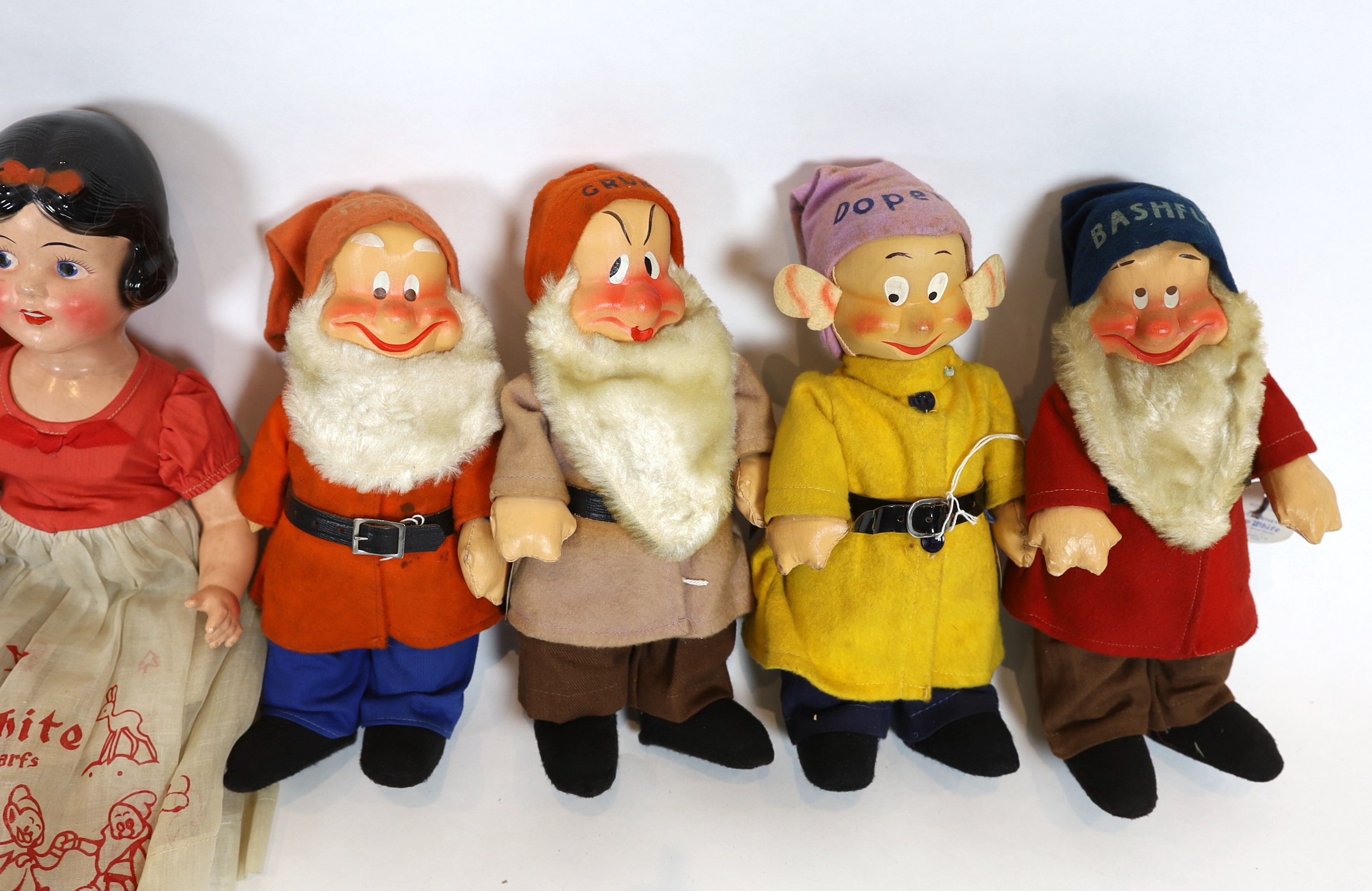 Snow White and the Seven Dwarfs, Ideal Novelty and Toy Co., US., copyright 1937, painted composition with coloured felt clothing, each rare in original box